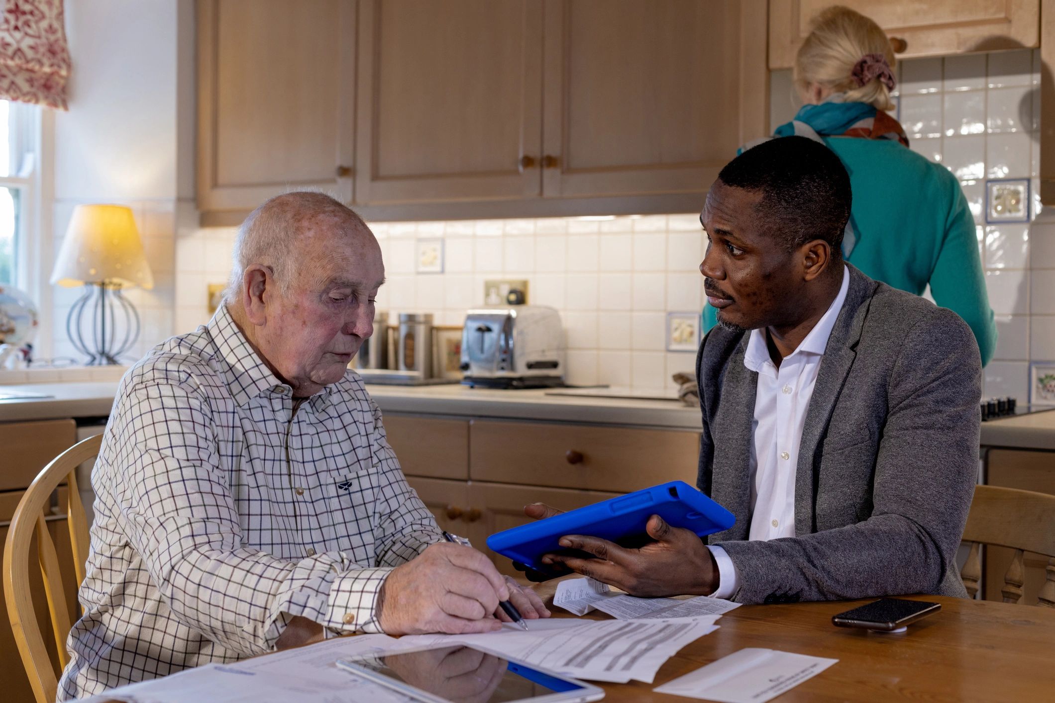 Family discussing financial plans with an advisor